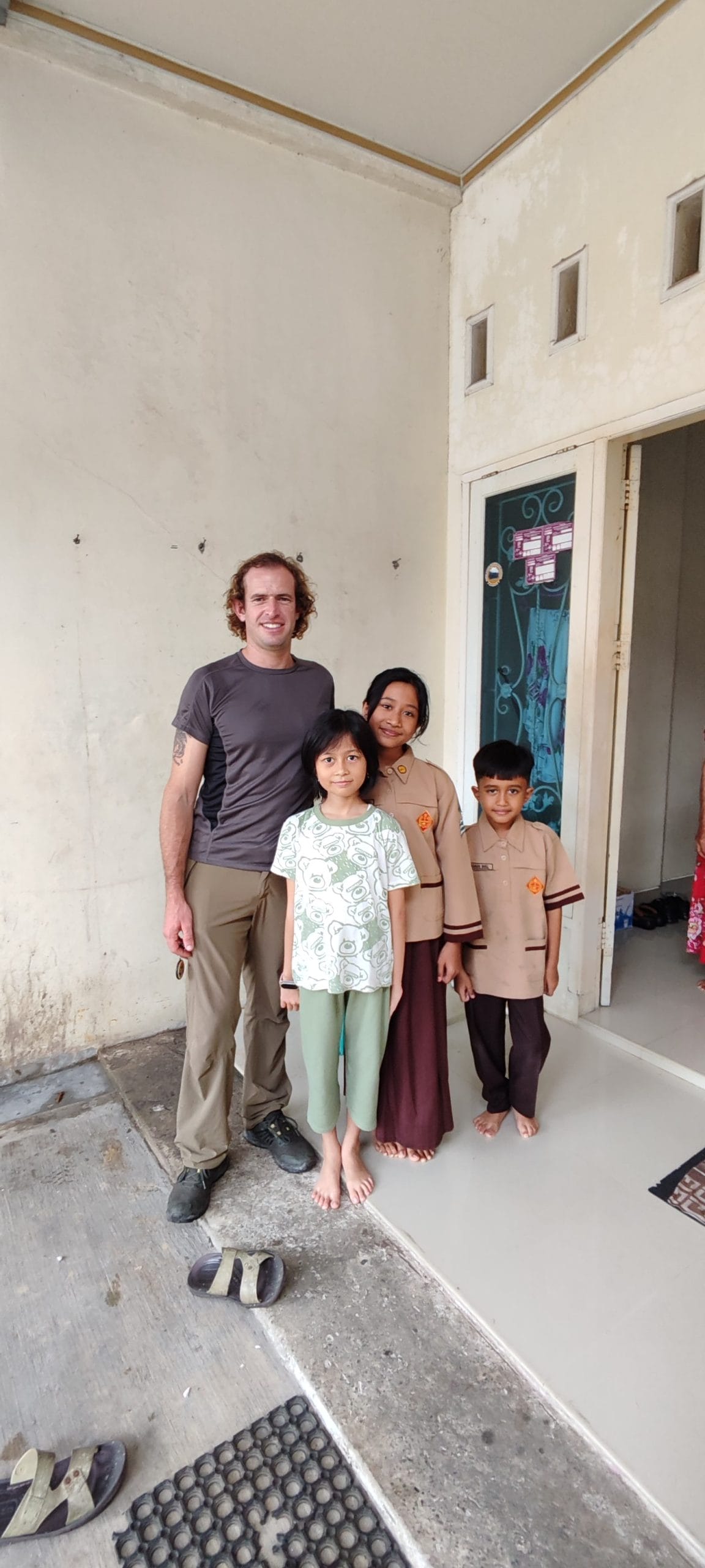 Andrian's family with Vincent Mentawai