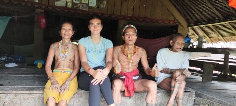 Solo female traveler enjoying a safe guided tour with Pulau Asli Tour in Siberut Mentawai