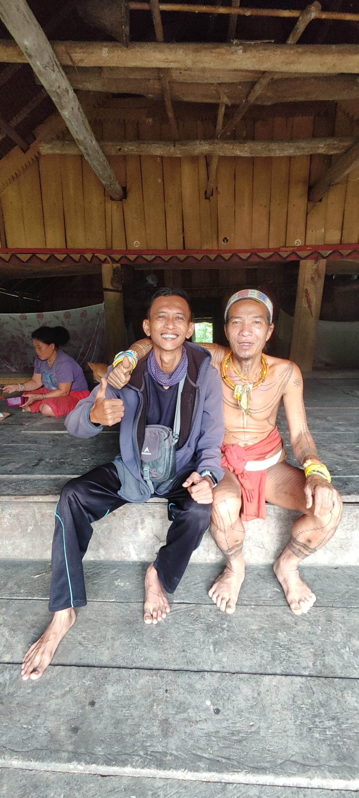 Andrian Salis with Mentawai Sikerei shaman on Uma porch, Siberut Island