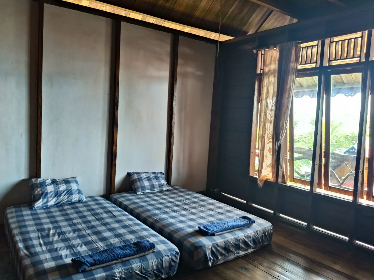 Private room at Mentawai surf camp — clean and comfortable, Siberut Island